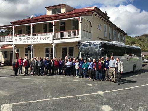 A group of elderly people on a bus tour 